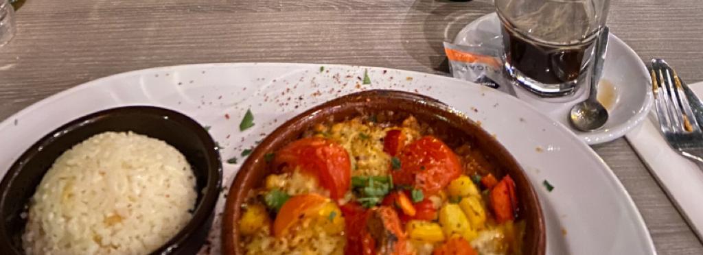 Turkish guveç; a casserole like dish with tomatoes, eggplant, spices, and rice