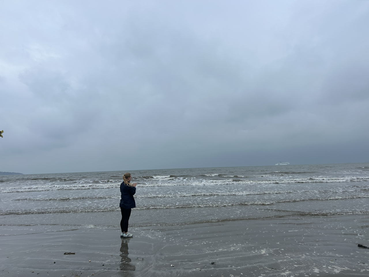 My friend running on the beach