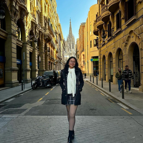 Student standing in street in Barcelona