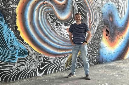 Myself next to some local street art in Berlin