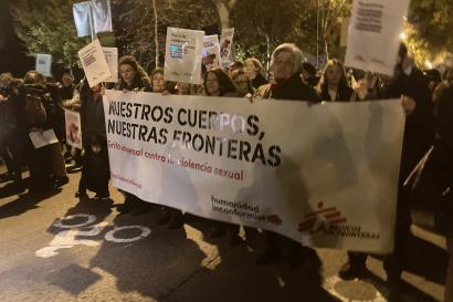 Photo of women holding banner at Atocha manifestation in Madrid