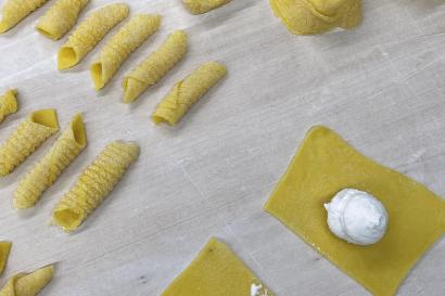 Tortellino and garganelli making during the pasta cooking class in Bologna 