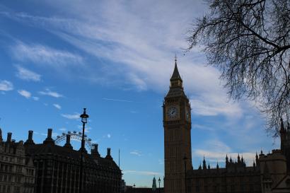 Photo of Big Ben with glimpse of the London Eye in the background.