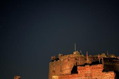 A photo of Edinburgh Castle in Scotland at night.