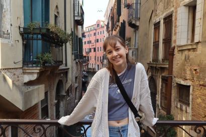 The author posed along the venice canal