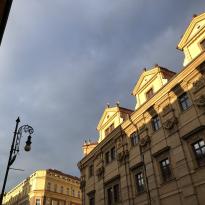 Buildings in evening light with old street lamp