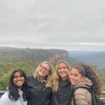 A group photo in front of the Blue Mountains
