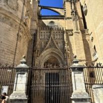 side of cathedral with arches and towers 