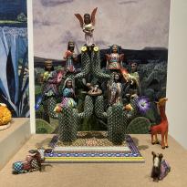 Model of Mexican traditional nativity scene, set in a cactus with multiple figurines