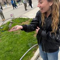 Holding a parrot!