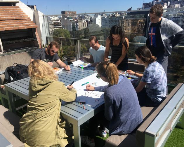 A group of students hanging out and studying on the Buenos Aires Center terrace