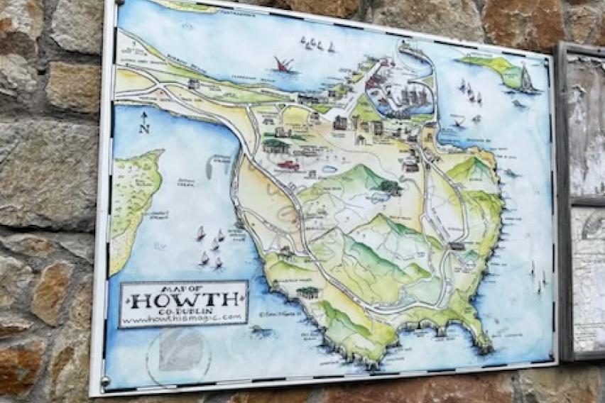 Artistic map of Howth, Ireland on a stone wall. 