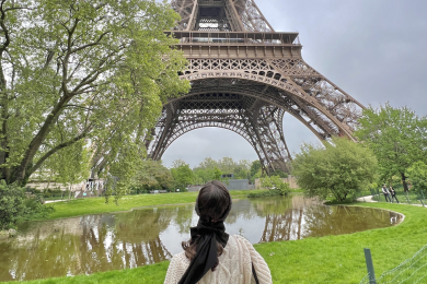 Student looking at Eiffel Tower in Paris, France