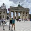 Me standing next to the Brandenburg Gate