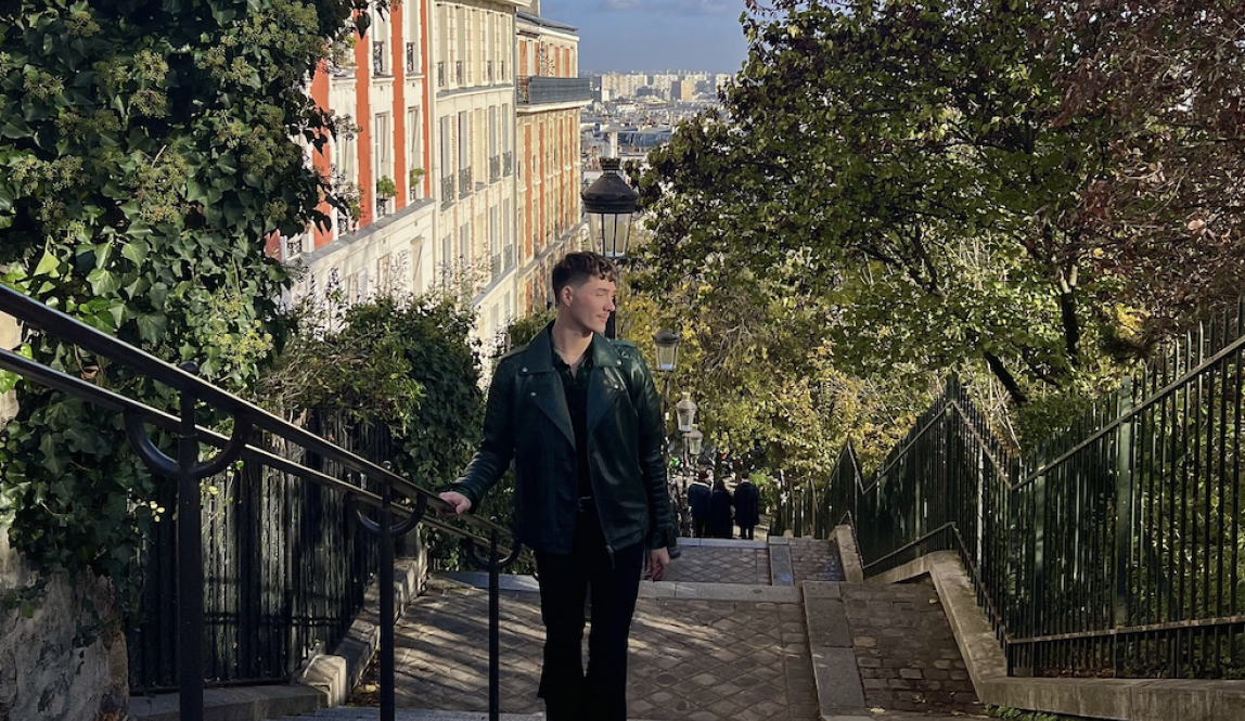 Student walking up Montmartre Steps in Paris, France