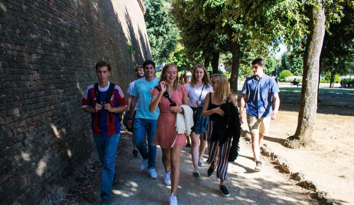 Students Walking down a street in Siena.