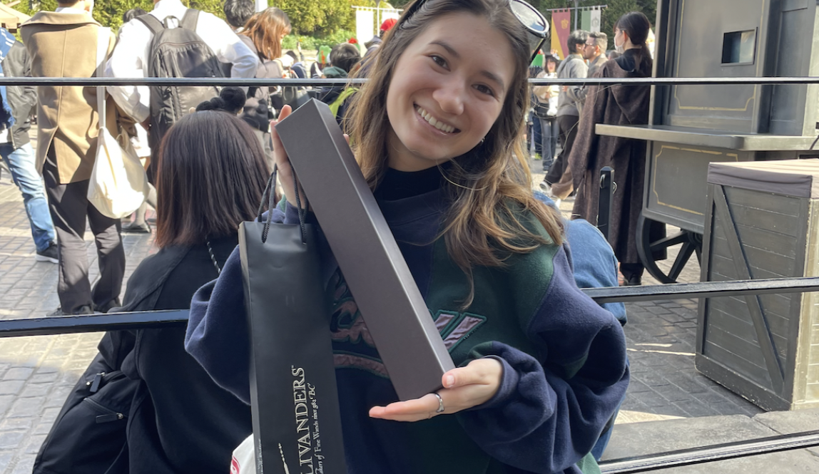 A photo with my new wand purchase from Olivanders!