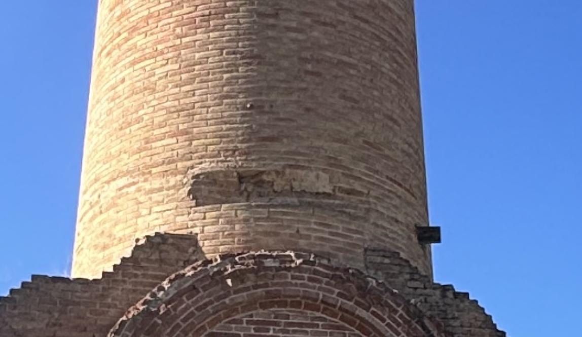 brick towers with sky background 