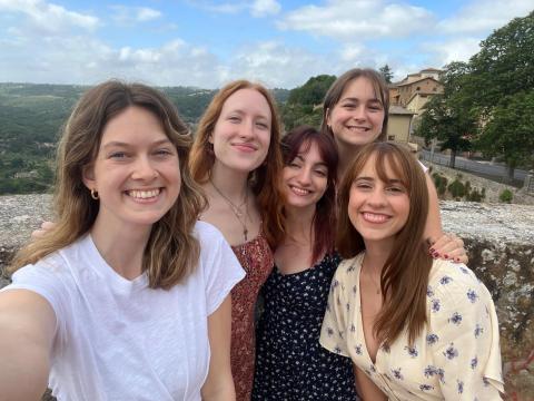 A group photo of the author and four friends in Orvieto, overlooking the hills in the surrounding countryside