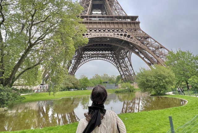 Student looking at Eiffel Tower in Paris, France