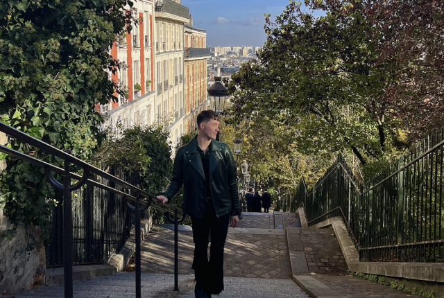 Student walking up Montmartre Steps in Paris, France