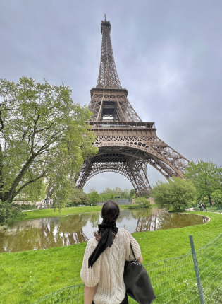 Student looking at Eiffel Tower in Paris, France