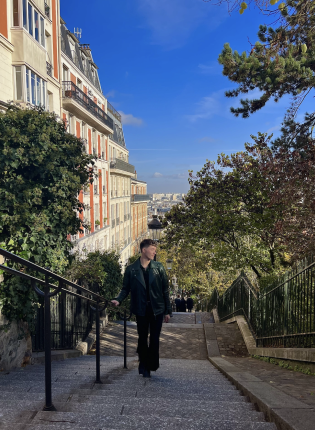 Student walking up Montmartre Steps in Paris, France