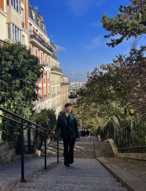 Student walking up Montmartre Steps in Paris, France