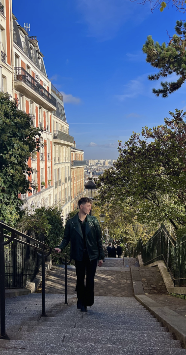 Student walking up Montmartre Steps in Paris, France