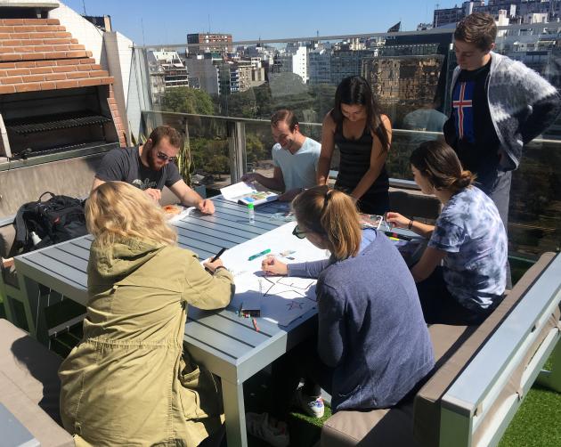 A group of students hanging out and studying on the Buenos Aires Center terrace