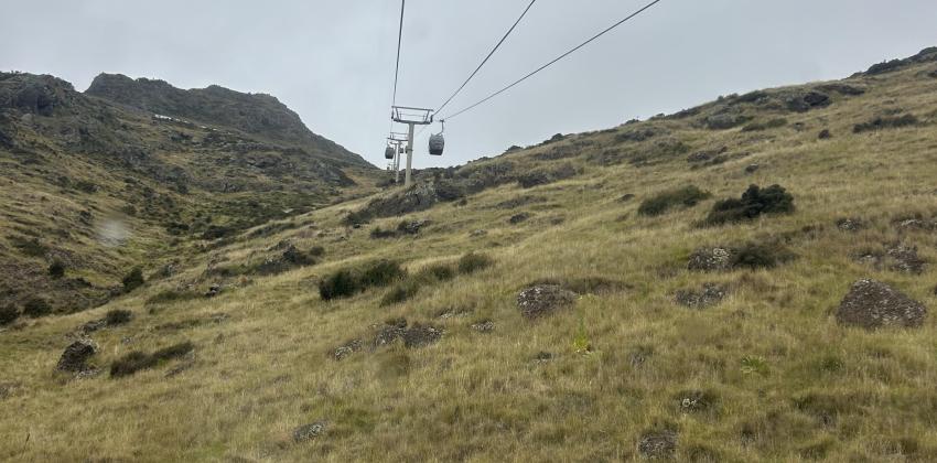 A picture looking up at the Christchurch Gondola in motion.